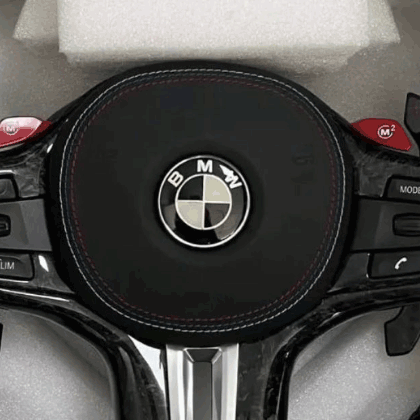 Black forged carbon steering wheel with leather airbag cover and led display- BMW G chassis